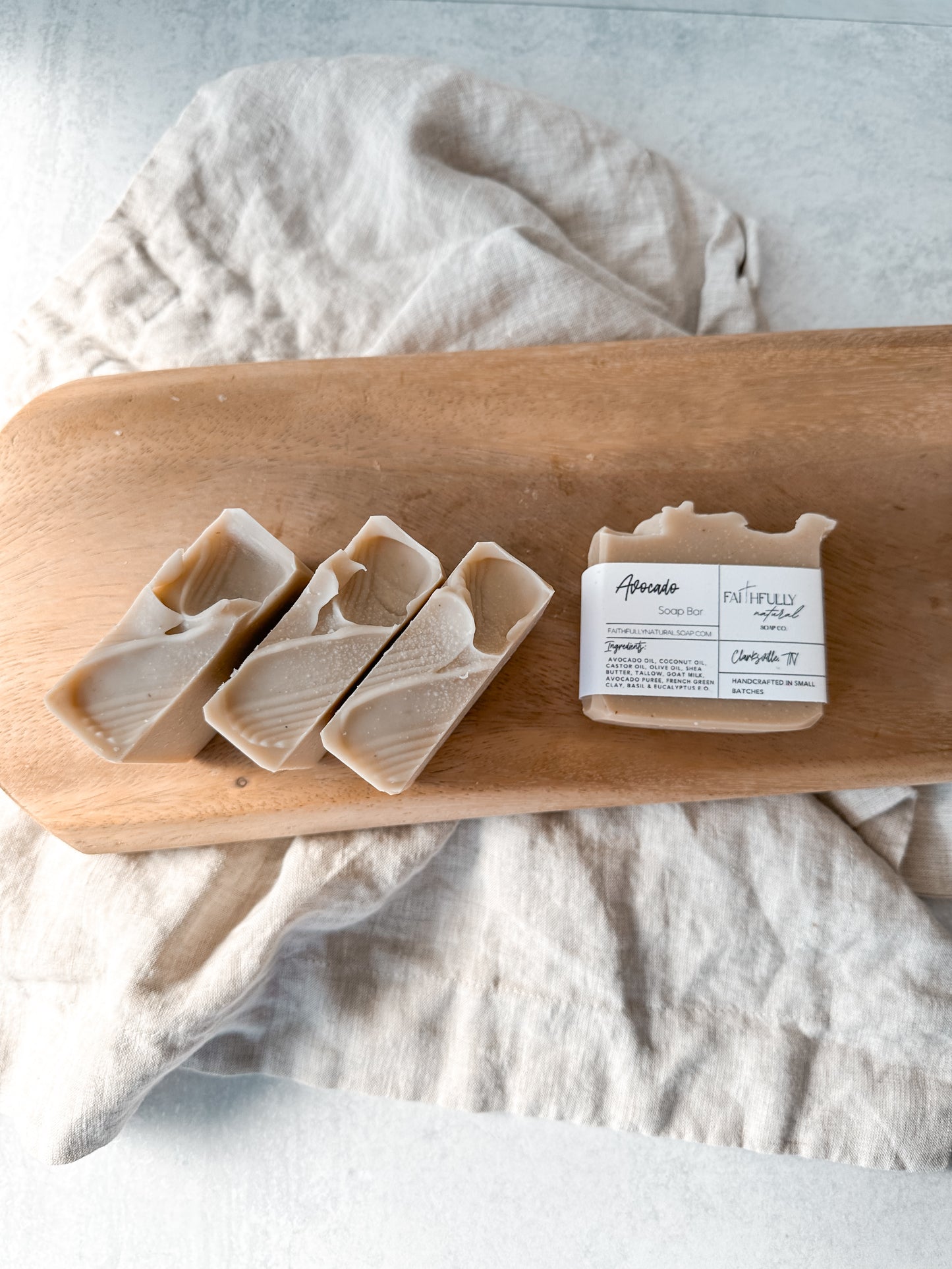 Natural Avocado Tallow Soap Bar on a cutting  board